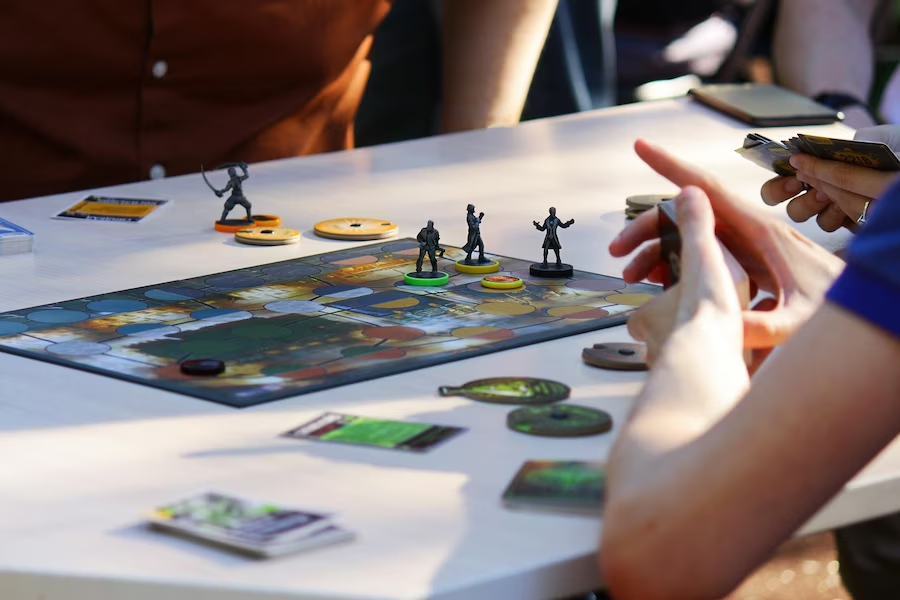 People playing board games on a table