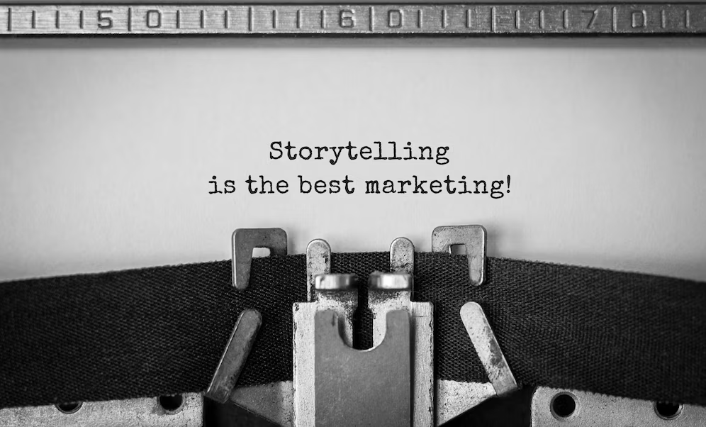 A typewriter with the text "Storytelling is the best marketing”